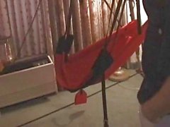 Silly MILF giggles and squirts in fuck swing