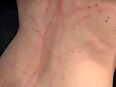 Tit bound sub caned on her red raw chest