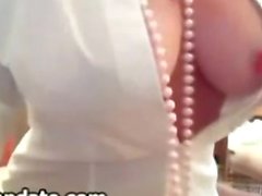 Hot MILF with big boobs teasing on webcam