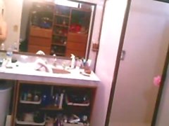 My Bathroom spycam caught sexy milf Julia