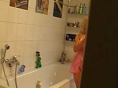 Sexy blonde milf gives her man a show in the bathroom